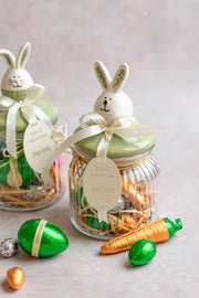 Pote vidro com tampa verde de coelho e ovinhos