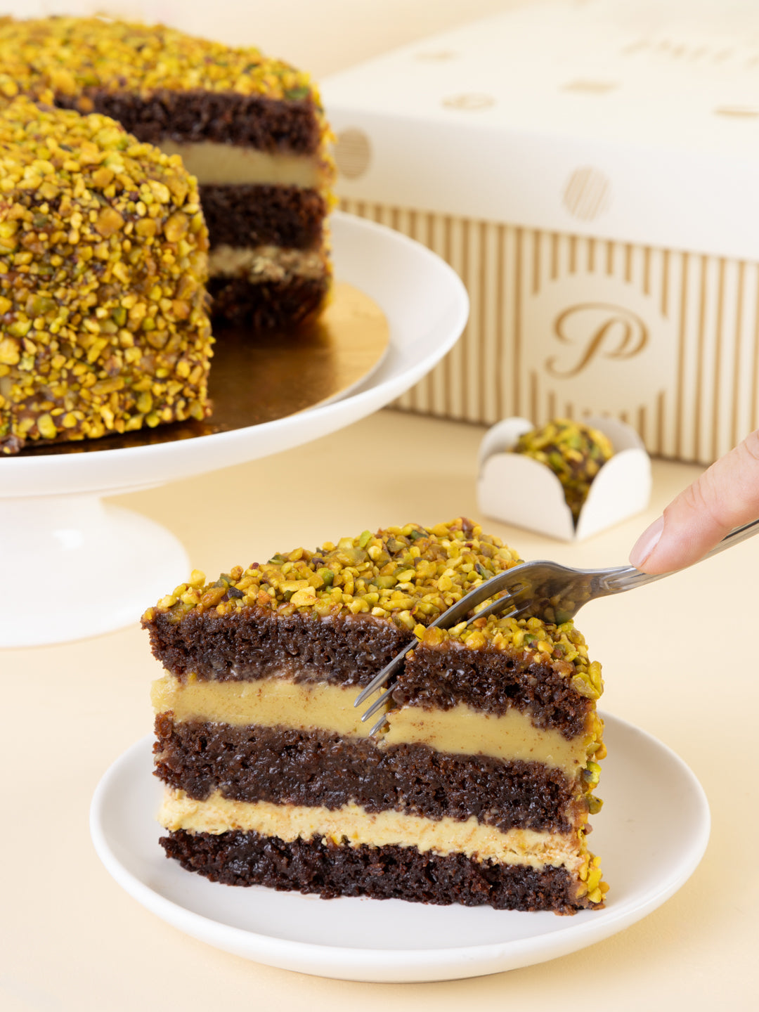 Bolo de Chocolate com Brigadeiro de Pistache - UN